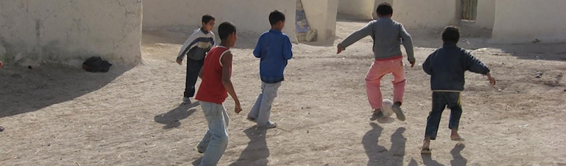 Children playing soccer