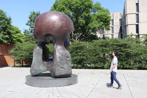 A SISRM fellow examines Nuclear Energy Sculpture 